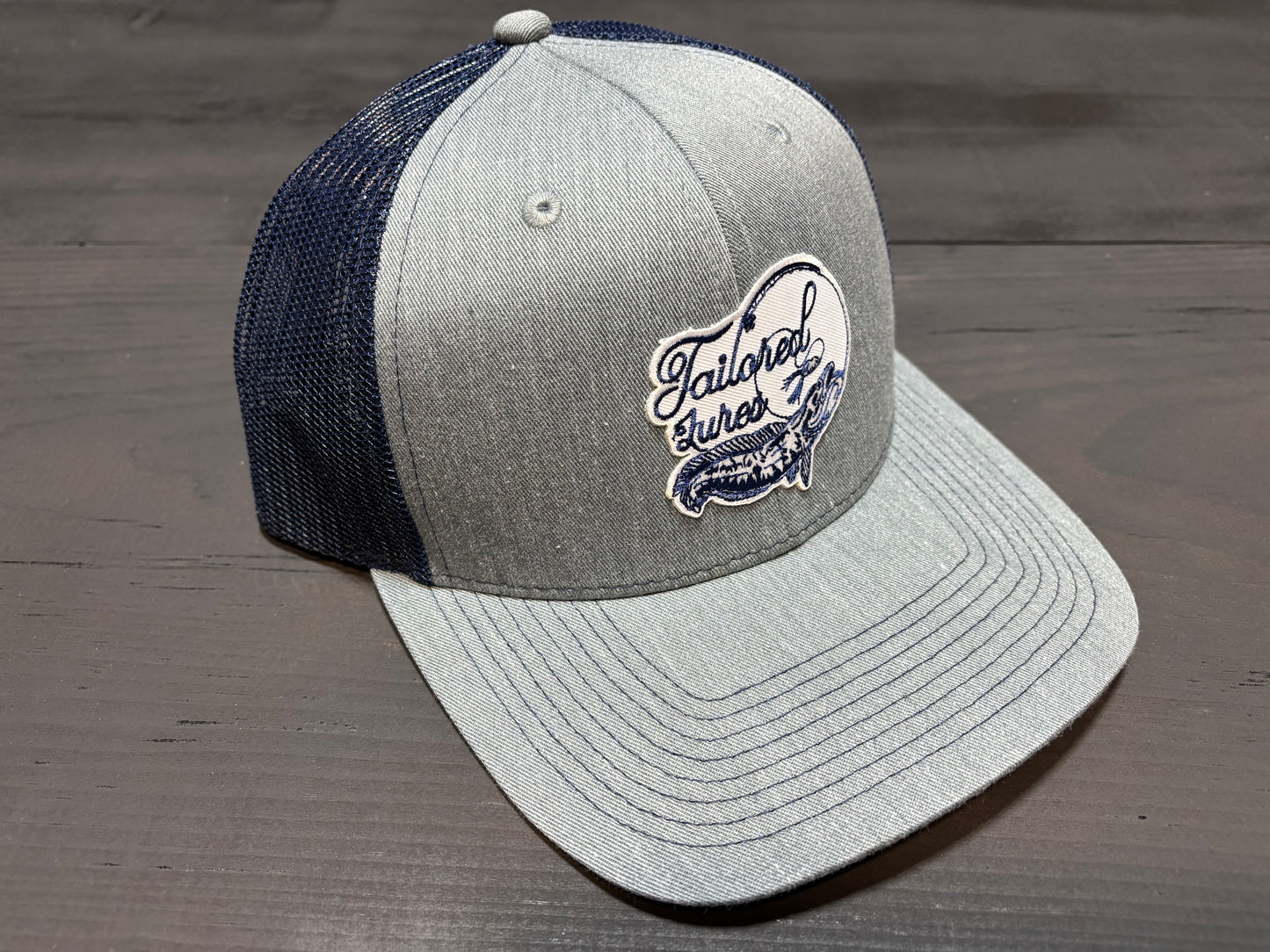 Tailored Lures trucker style hat (snap back)