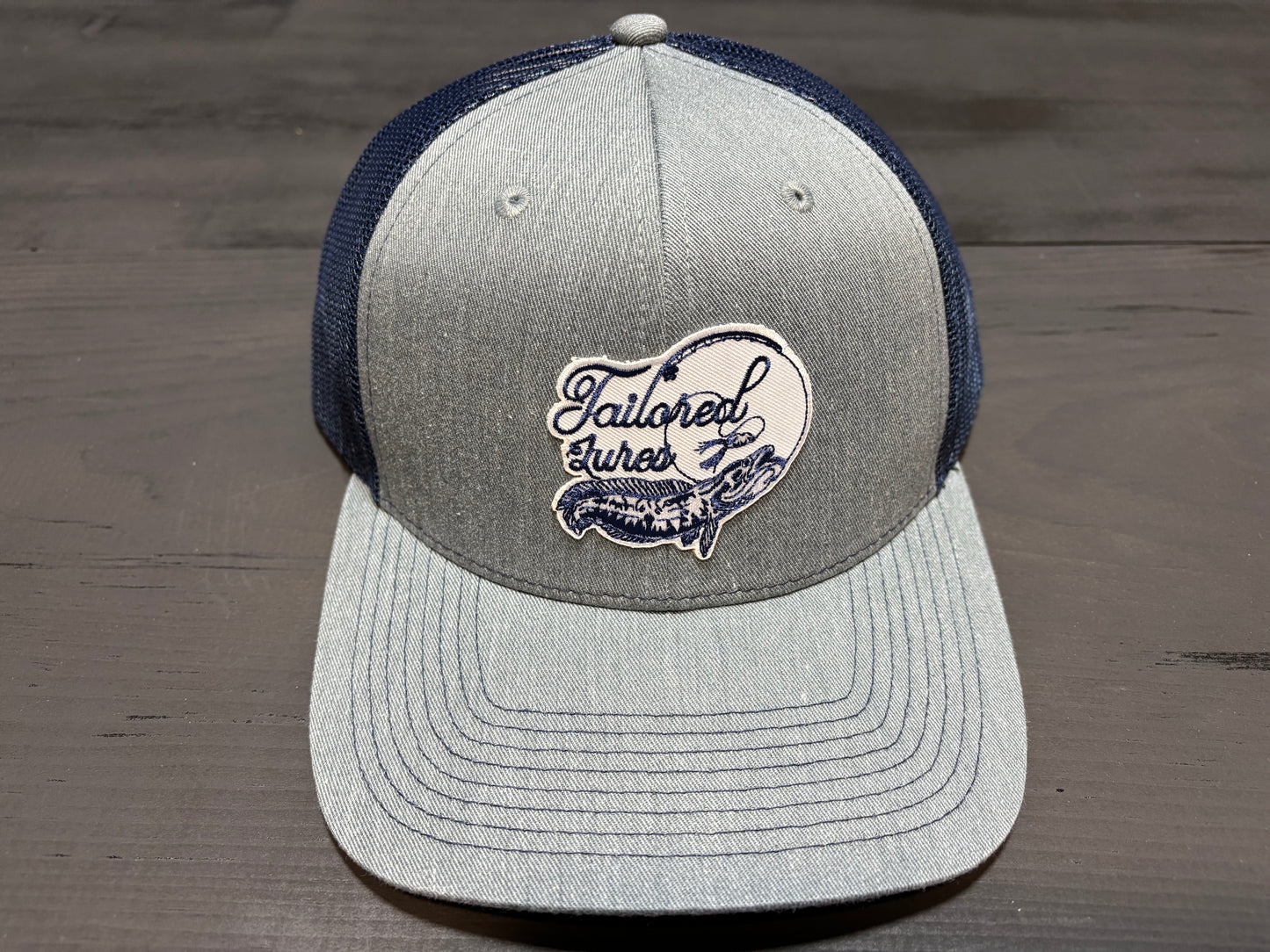 Tailored Lures trucker style hat (snap back)